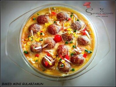 Baked Gulab Jamun: A Warm, Creamy Indian Dessert - Plattershare - Recipes, food stories and food lovers Delicious baked mini Gulab Jamun served in a sweet syrup with colorful toppings.