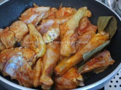 Aromatic Chicken Ghee Roast: A Flavorful Indian Recipe - Plattershare - Recipes, food stories and food lovers Aromatic Chicken Ghee Roast in a pan, flavorful Indian recipe.