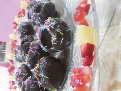 Decadent Chocolate Golgappe with Peanut Praline & Vanilla Milkshake - Plattershare - Recipes, food stories and food lovers Chocolate Golgappe with colorful sprinkles and peanut praline topping.