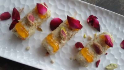 Healthy No-Cook Oats & Paneer Rolls with Pistachio Garnish - Plattershare - Recipes, food stories and food lovers Delicious no-cook oats and paneer rolls garnished with pistachios and rose petals.