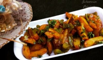 Spicy Schezwan Potatoes: A Crispy, Flavorful Indo-Chinese Starter - Plattershare - Recipes, food stories and food lovers Spicy Schezwan Potatoes: A Crispy, Flavorful Indo-Chinese Starter - Plattershare - Recipes, food stories and food lovers