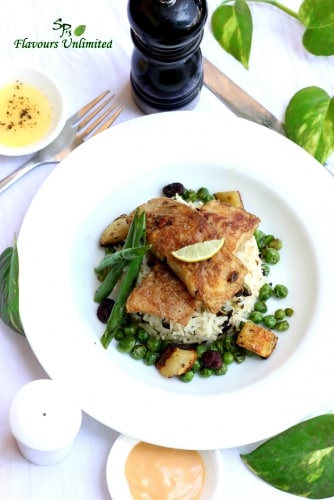 Grilled Basa Fillet Served In A Bed Of Capsicum Rice Accompanied With Lemon Butter Sauce And Veggies - Plattershare - Recipes, Food Stories And Food Enthusiasts