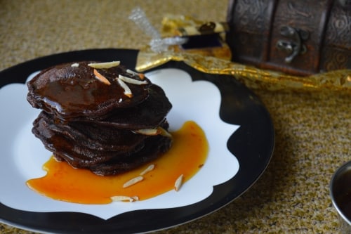 Chocolate Malpuas With Orange Caramel Sauce - Plattershare - Recipes, food stories and food lovers