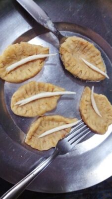 Diya-Shaped Sweet Treats: A Festive Indian Dessert - Plattershare - Recipes, food stories and food lovers Diya-Shaped Sweet Treats: A Festive Indian Dessert - Plattershare - Recipes, food stories and food lovers