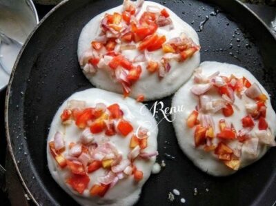 Cheesy Onion Tomato Uttapam: A South Indian Delight - Plattershare - Recipes, food stories and food lovers Cheesy Onion Tomato Uttapam: A South Indian Delight - Plattershare - Recipes, food stories and food lovers