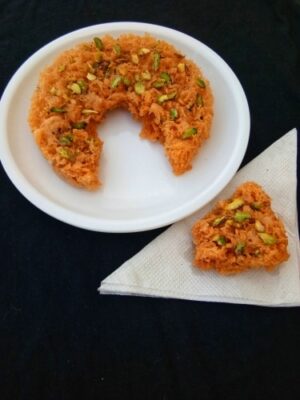 Paneer Ghevar: A Delicate Honeycomb Dessert with Pistachios - Plattershare - Recipes, food stories and food lovers Paneer Ghevar: A Delicate Honeycomb Dessert with Pistachios - Plattershare - Recipes, food stories and food lovers
