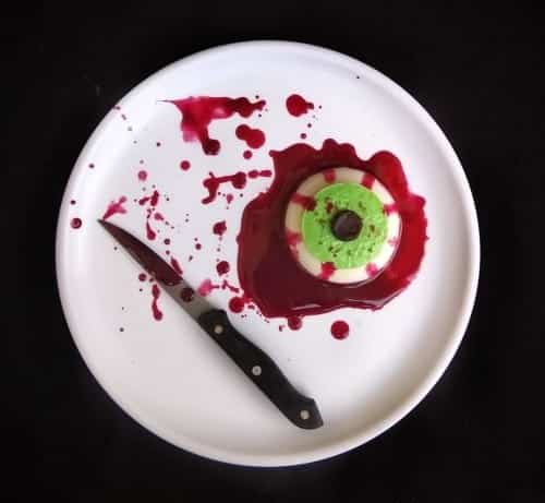 Halloween Spooky Bloody Eye Ball Representing coconut milk and banana pudding with chocolate crumb lens and beetroot sauce - Plattershare - Recipes, food stories and food lovers