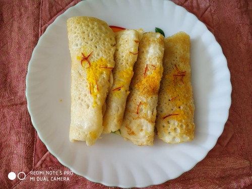 Kesariya Patishapta - Plattershare - Recipes, Food Stories And Food Enthusiasts