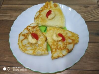 Cardamom-Scented Coconut Crepes with Jaggery and Dried Fruit (Patishapta-Inspired) - Plattershare - Recipes, food stories and food lovers Cardamom-Scented Coconut Crepes with Jaggery and Dried Fruit (Patishapta-Inspired) - Plattershare - Recipes, food stories and food lovers