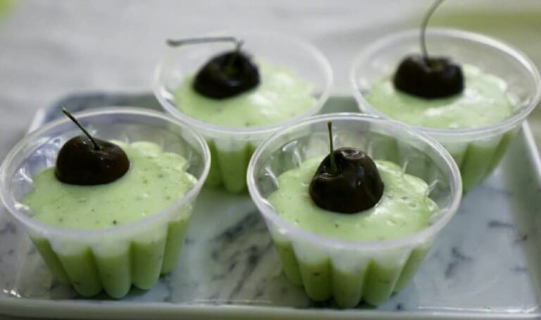Creamy Paneer Kiwi Dessert with Cherry Garnish - Plattershare - Recipes, food stories and food lovers Creamy Paneer Kiwi Dessert with Cherry Garnish - Plattershare - Recipes, food stories and food lovers