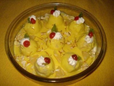 Fruity Paneer Balls in Pineapple Saffron Custard: A Delicious Indian Dessert - Plattershare - Recipes, food stories and food lovers Fruity Paneer Balls in Pineapple Saffron Custard - a delicious Indian dessert with paneer, pineapple.