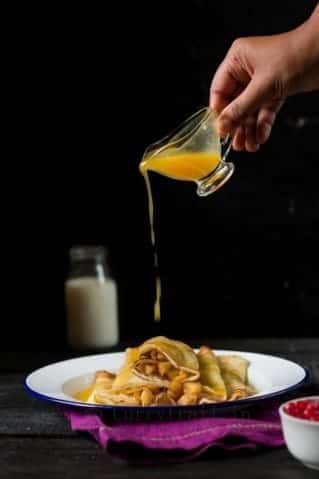 Crepes Filled With Apples & Topped With Orange Sauce - Plattershare - Recipes, food stories and food enthusiasts