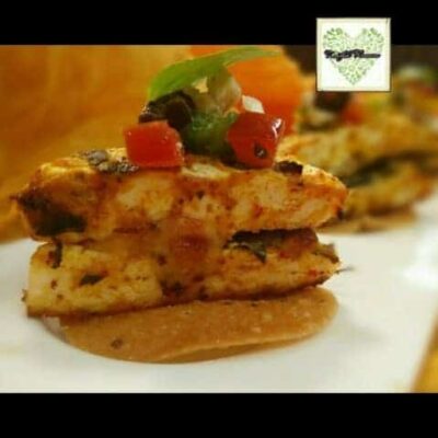 Mozzarella-Stuffed Achari Paneer Tikka with Zesty Pepper Salsa - Plattershare - Recipes, food stories and food lovers Achari Paneer Tikka stuffed with mozzarella and topped with peppers and herbs.