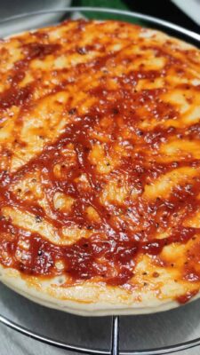 Loaded Vegetarian Pizza: A Crispy, Cheesy Delight - Plattershare - Recipes, food stories and food lovers Fresh baked pizza with spicy tomato sauce and melted cheese.