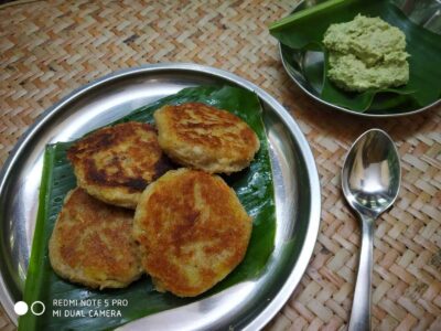 Nutrient-Rich Rajgira Tikki (Amaranth Fritters) for Fasting and Everyday Meals - Plattershare - Recipes, food stories and food lovers Golden brown potato cakes served on a stainless steel plate with a banana leaf lining.