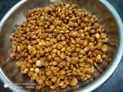 Hearty Red Lentil and Mutton Liver Stew (Lal Masoor Kaleji) - Plattershare - Recipes, food stories and food lovers Cooked fenugreek seeds in a metal bowl, ready for recipe preparation.