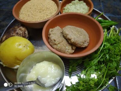 Nutritious & Delicious Rajgira Parathas (Amaranth Flatbreads) for Fasting & Everyday Meals - Plattershare - Recipes, food stories and food lovers Spicy Indian fish cutlets with cilantro, lemon, and spice powders on a metal tray.