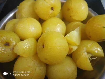 Tangy & Tasty Chatpata Amla: A Flavorful Indian Gooseberry Relish - Plattershare - Recipes, food stories and food lovers Juicy yellow lemons arranged in a bowl, perfect for recipes, cooking, or garnishing dishes.