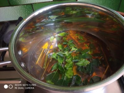 Invigorating Moringa, Lemongrass, and Turmeric Remedy Drink - Plattershare - Recipes, food stories and food lovers Boiling water with fresh leaves for herbal tea or infusion. Natural ingredients used for health and wellness.