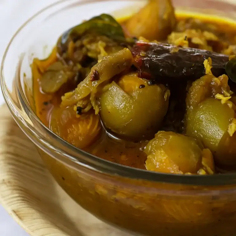 Ambeda Sakkara: Tangy Indian Olive Curry Recipe - Plattershare - Recipes, food stories and food lovers Ambeda Sakkara: Tangy Indian Olive Curry Recipe