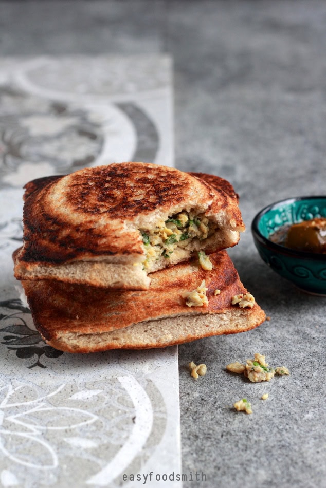 Achari Bhurjee Sandwich (Pickled Scrambled Egg Sandwich) - Plattershare - Recipes, food stories and food lovers Crunchy stuffed sandwich with paneer and vegetables, served with tangy chutney. Perfect for a quick snack or breakfast.