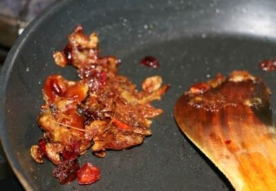 Black Rice Boorelu with Dry Fruits & Nuts - a healthy and delicious sweet treat with rich flavors.