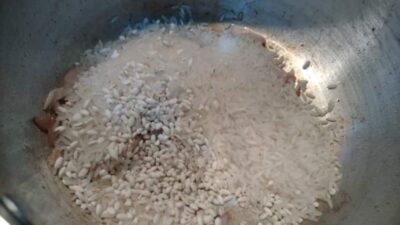 Creamy saffron risotto with mushrooms and barley, cooked to perfection with a rich, flavorful broth.