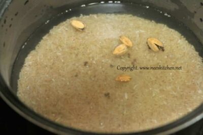 Pots for making Thai Jasmine Brown Rice Sweet Pongal in a pressure cooker.