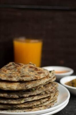 Delicious Indian flatbread with green olives and nigella seeds, offering an Italian twist. Perfect f.