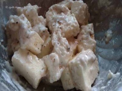 Chili garlic paneer in Indo-Chinese style, featuring crispy paneer cubes coated with spicy chili gar.
