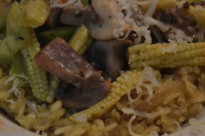 Creamy saffron risotto featuring mushrooms and barley, perfect for a comforting and flavorful meal.