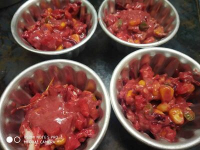 Fresh mixed vegetable pickle in stainless steel bowls, vibrant and flavorful.