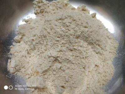 Lite flour in a silver bowl for baking recipes.