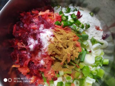 Fresh chopped vegetables with spices and seasoning for a delicious homemade recipe.