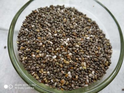 Roasted chia seeds in a glass bowl, ready to add nutritional value to dishes or smoothies.