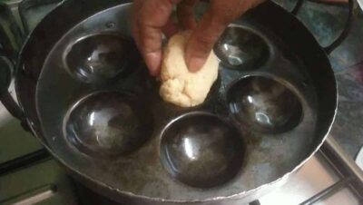 Empty tappit with dough ball, used for making Indian snacks and sweets.