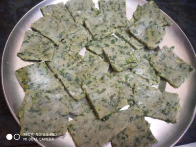 Herb and spinach stuffed flatbread, fresh and tasty Indian snack or breakfast option.